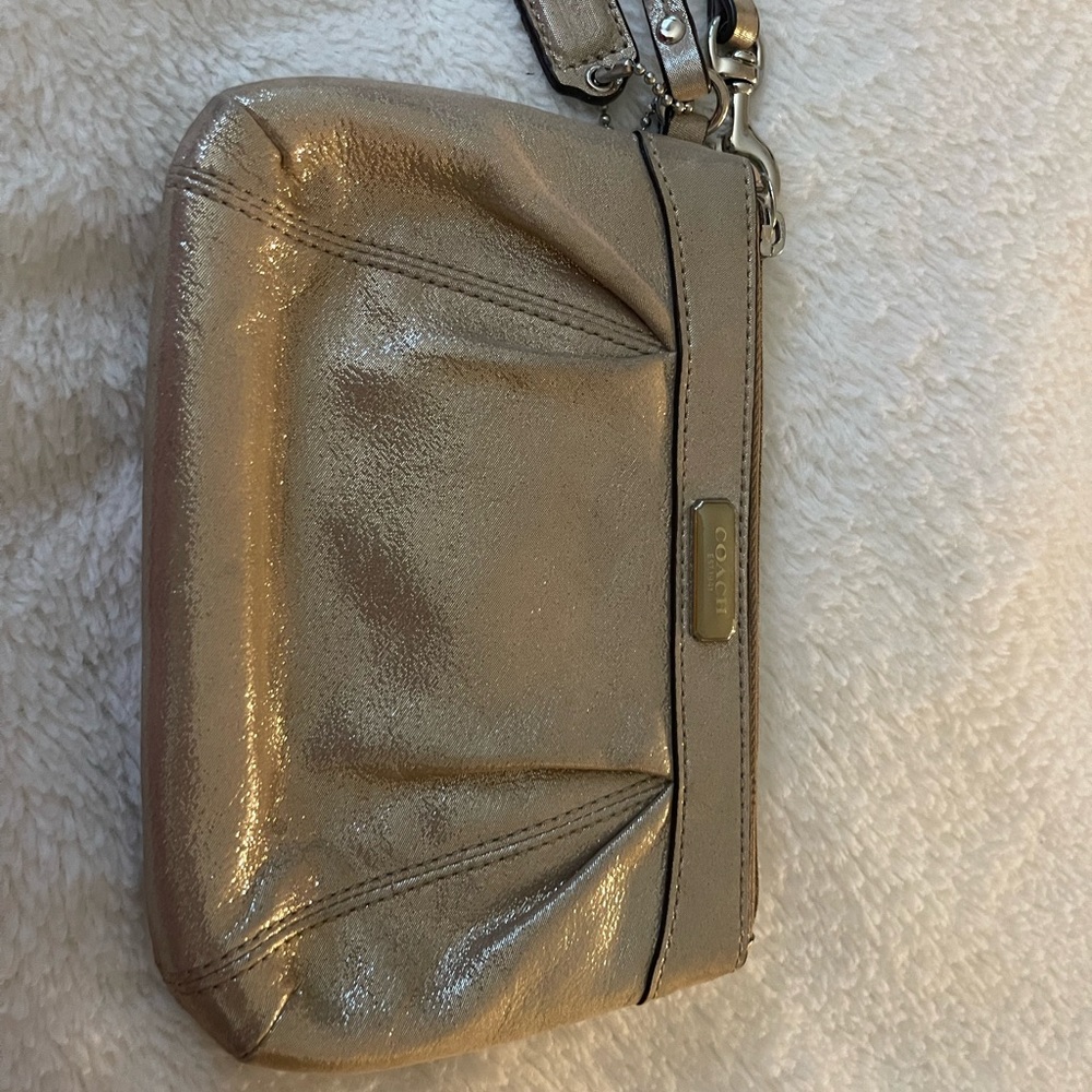 Coach metallic gold wristlet